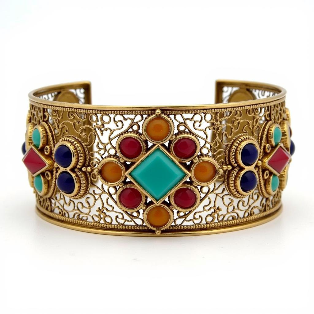 Art Deco filigree bracelet with gemstones forming a geometric pattern