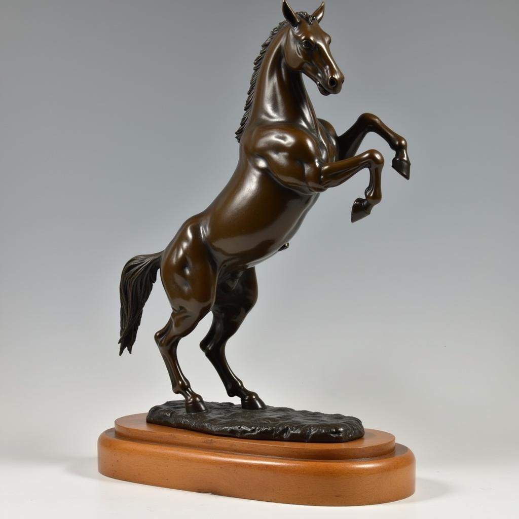 Bronze Bucking Bronco Sculpture on Wooden Base