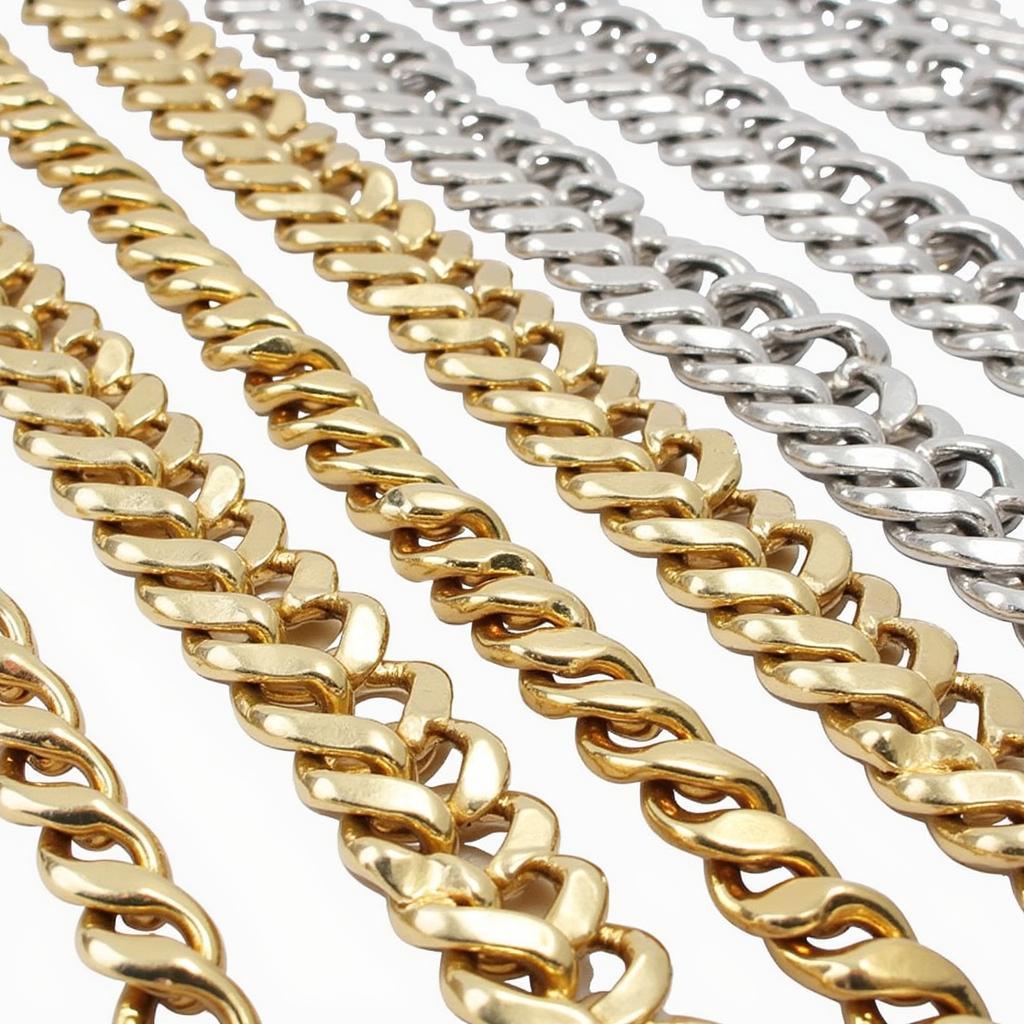 Gold and silver art curb chains on display