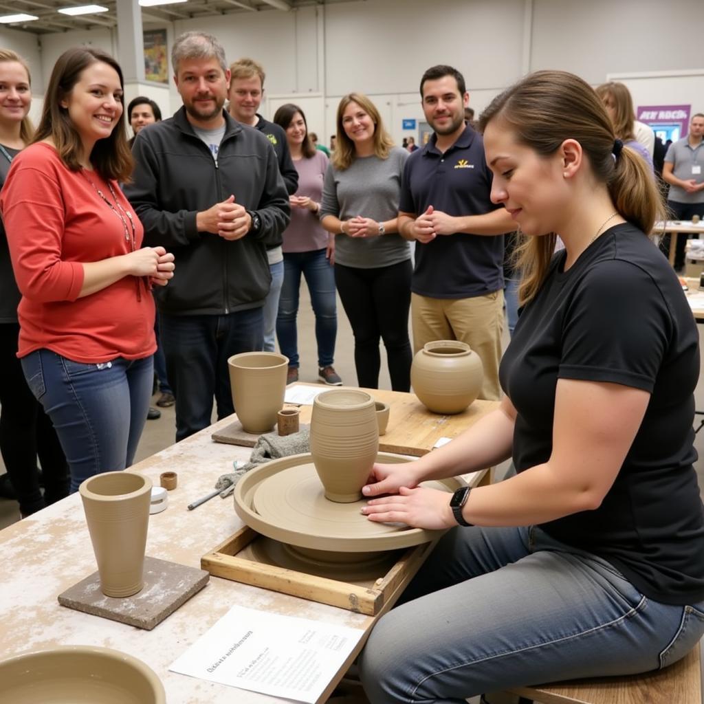 Artist demonstrating pottery making at La Cueva Arts and Crafts Fair.