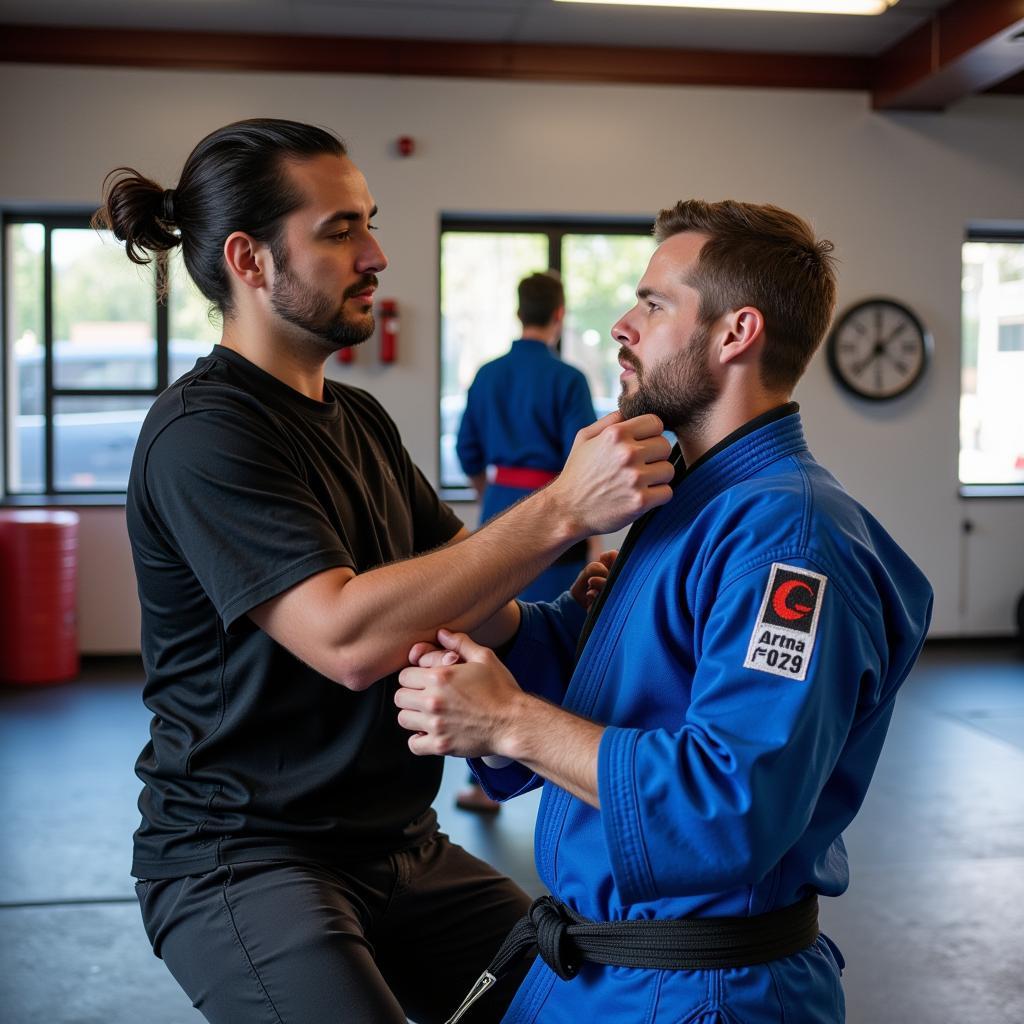 Martial Arts Instructor Guiding Student