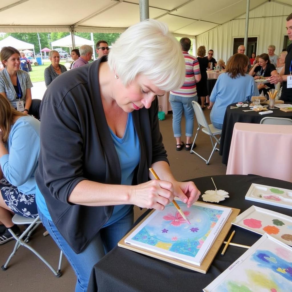 Artist demonstrates techniques at Port Huron Art on the River