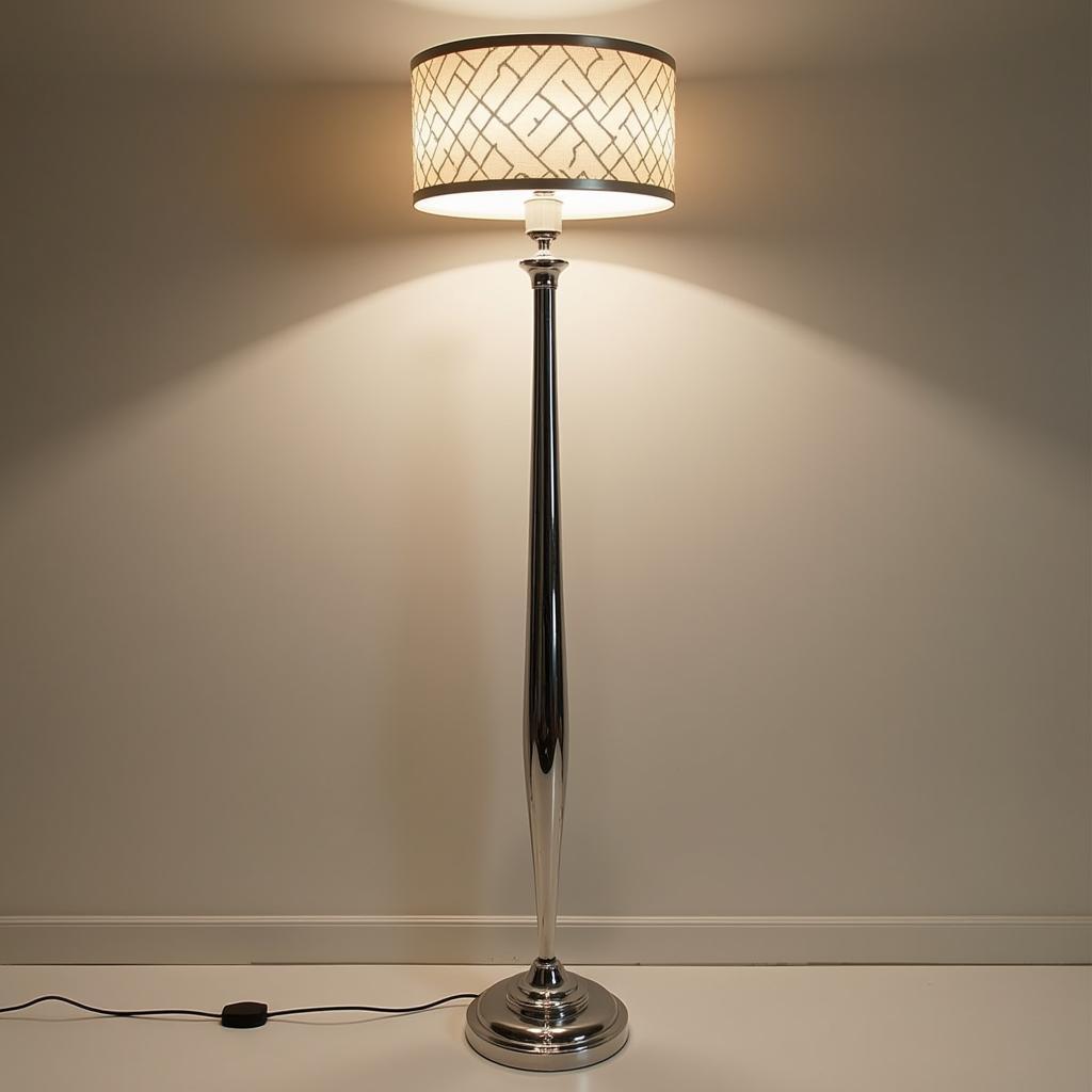 Art Deco chrome floor lamp with a geometric base and stepped design, showcasing its sleek lines and reflective surface.