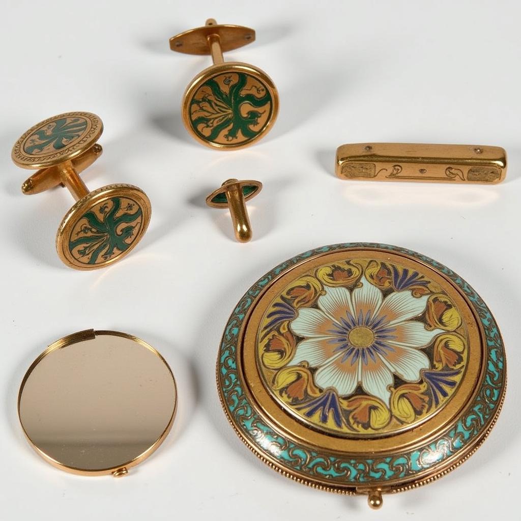 Art Nouveau gifts for him and her, including cufflinks, tie clips, compact mirrors, and cigarette cases, reflecting the elegance and sophistication of the era.