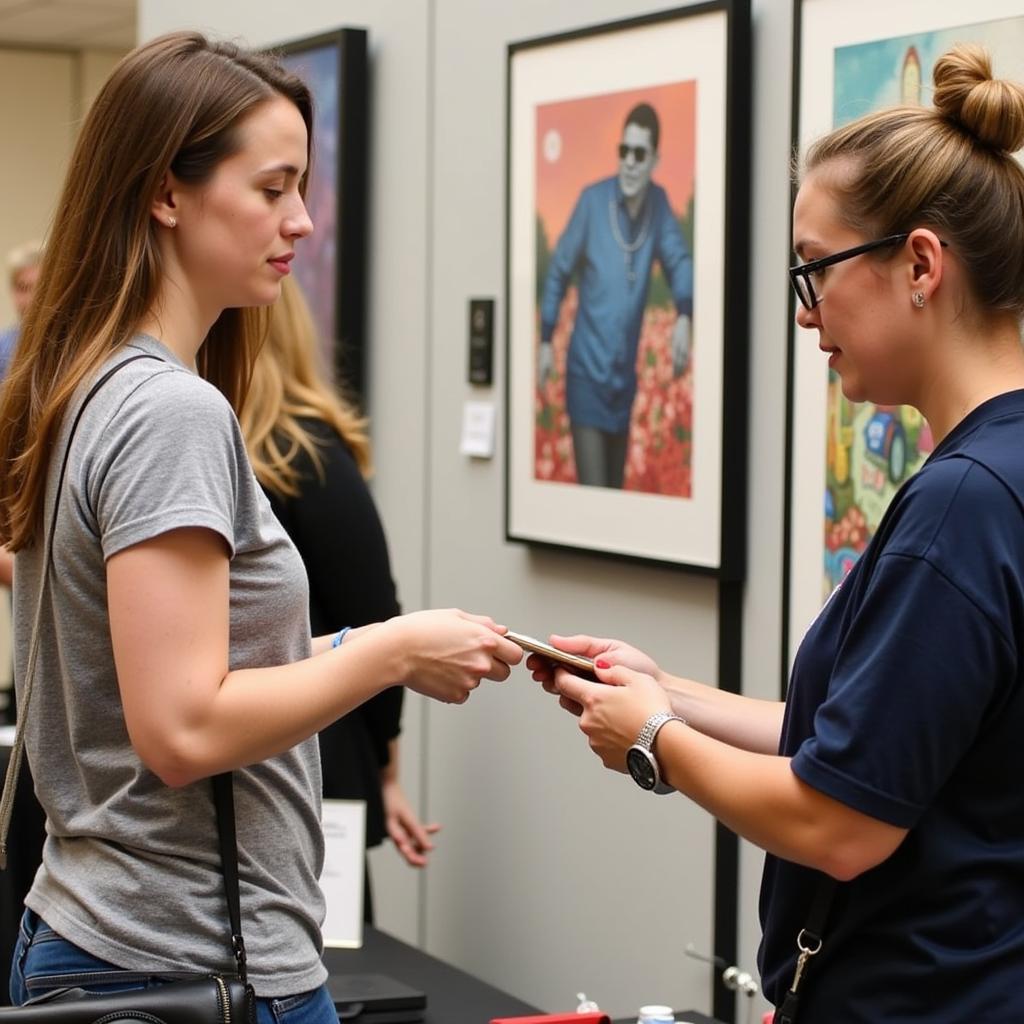 Columbia Mall Art Show: Visitor Acquiring Artwork