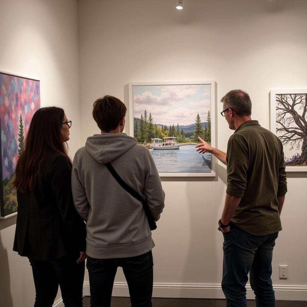 Issaquah Art Walk artist interacting with visitors and discussing their artwork