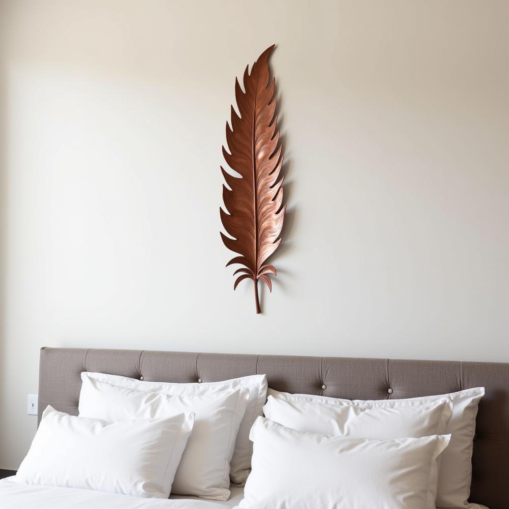 Metal Feather Wall Sculpture in a Bedroom