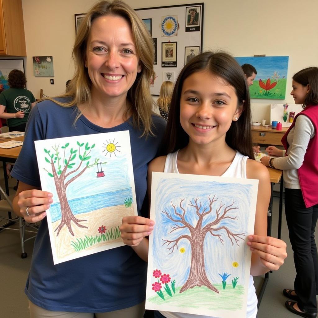 Mom and Daughter Proudly Displaying Artwork