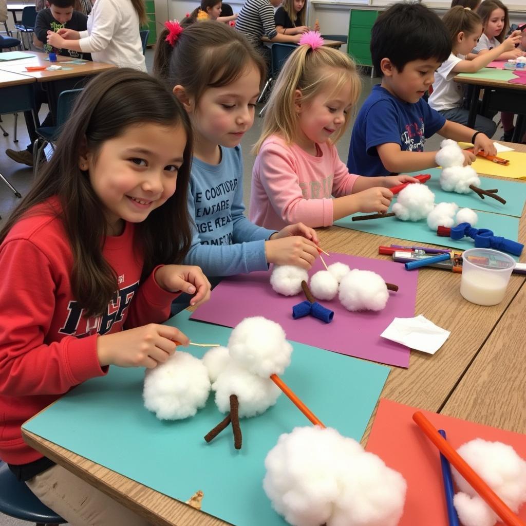 First graders creating cotton ball snowmen winter art projects.