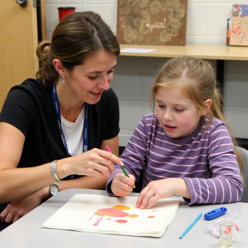 Various adaptive art techniques being applied through personalized instruction in a one-on-one setting.