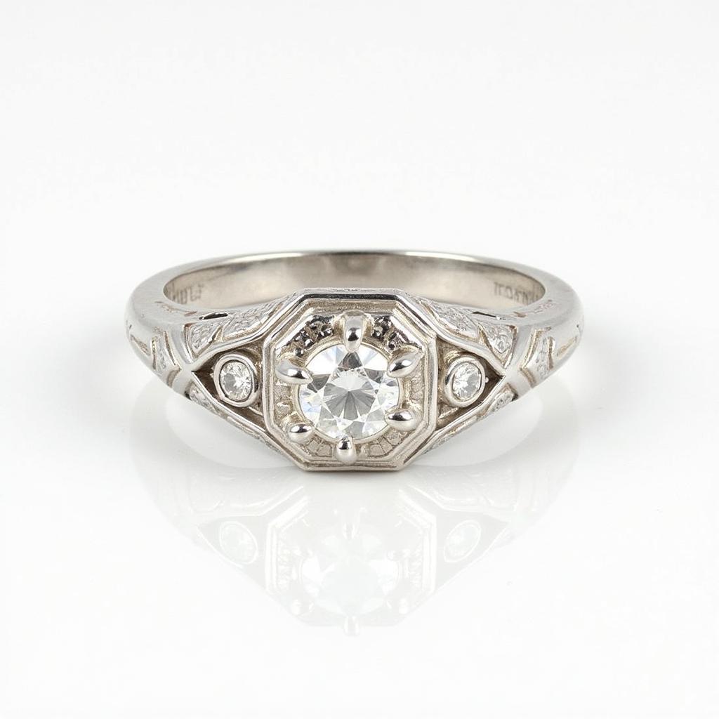 Art Deco platinum round ring with diamonds, showcasing intricate geometric patterns and sparkling brilliance.