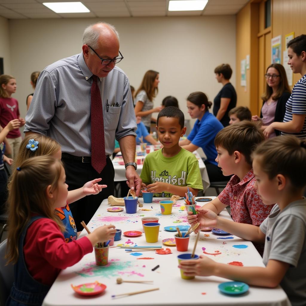 Bob Blazier interacting with community members at an arts program