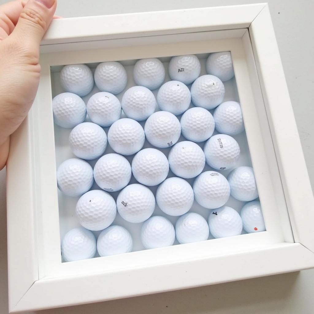 DIY Golf Ball Wall Art in a Shadow Box