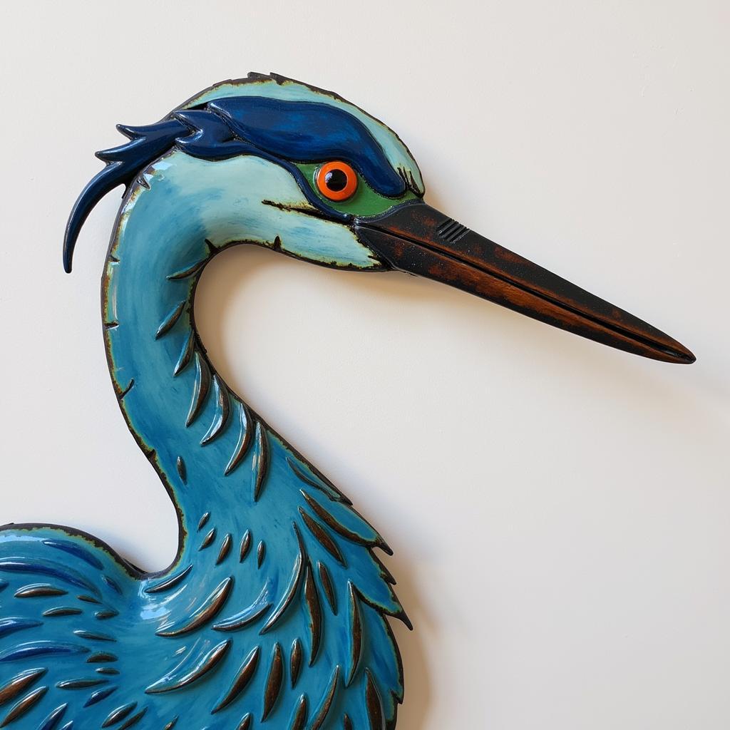 Handmade blue heron metal wall decor.