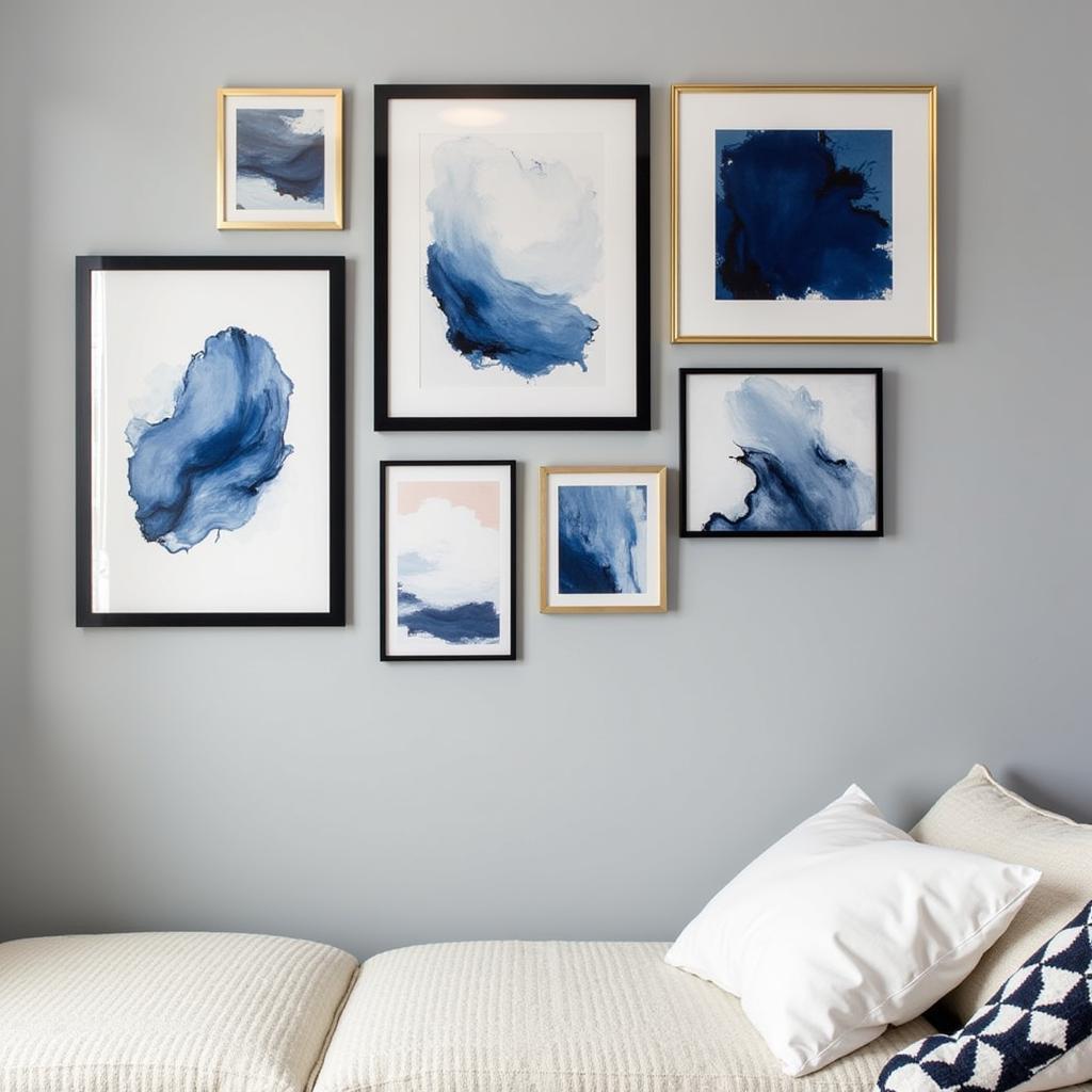 Navy blue abstract art in a gallery wall arrangement