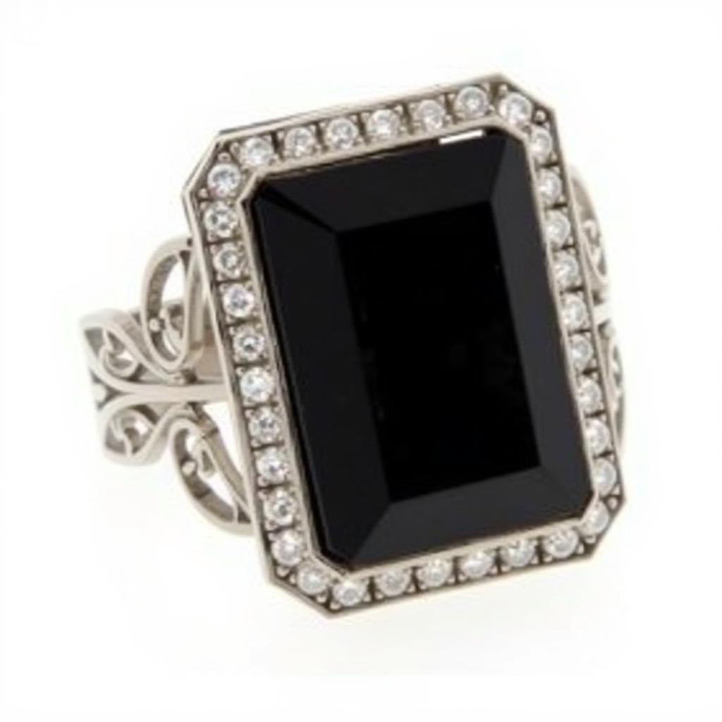 Vintage onyx and diamond Art Deco ring with geometric design