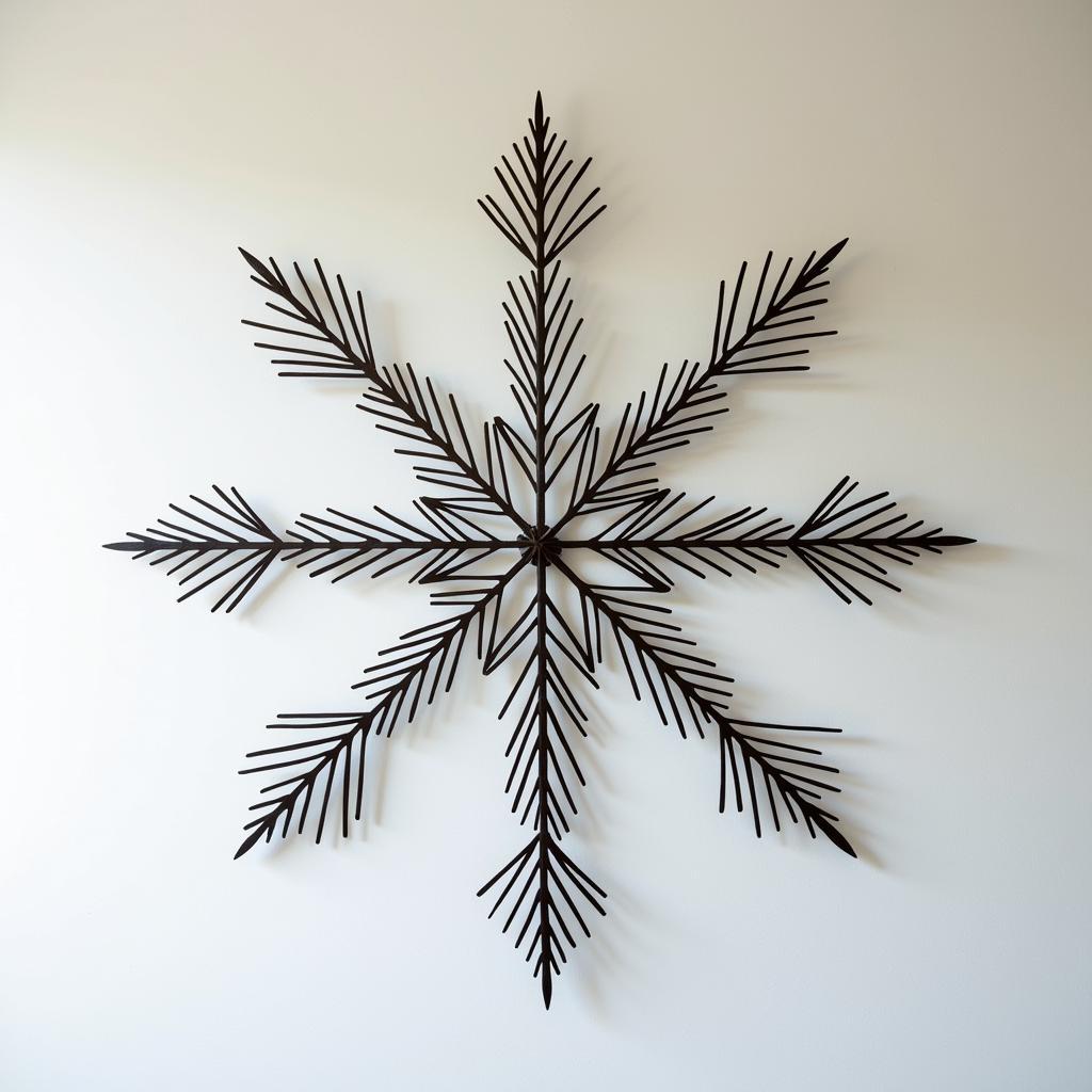 Abstract Winter Metal Wall Sculpture with intricate snowflake design