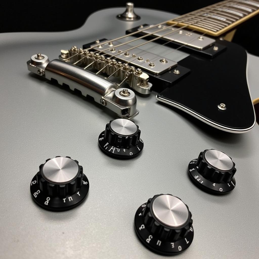 Close-up view of the Epiphone Adam Jones Les Paul Custom, showcasing its silverburst finish and unique hardware.