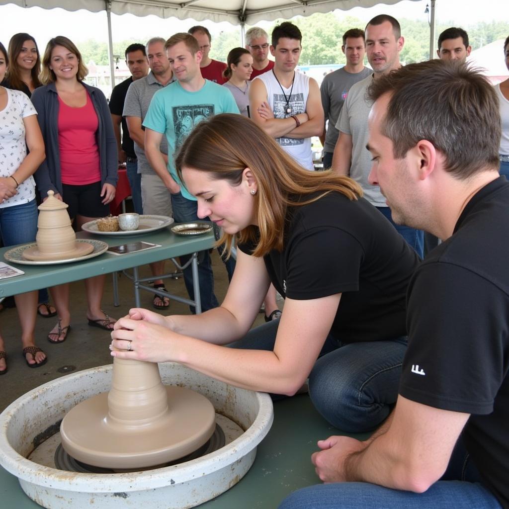 Artist demonstrating pottery techniques at the Lake George Arts and Crafts Festival